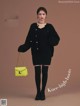 A woman in a black sweater dress and thigh high boots holding a yellow bag.